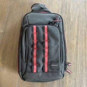Oakley sling cross body bag